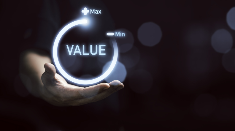 Businessman holding virtual download icon progress for increasing value added to business product and service concept.
